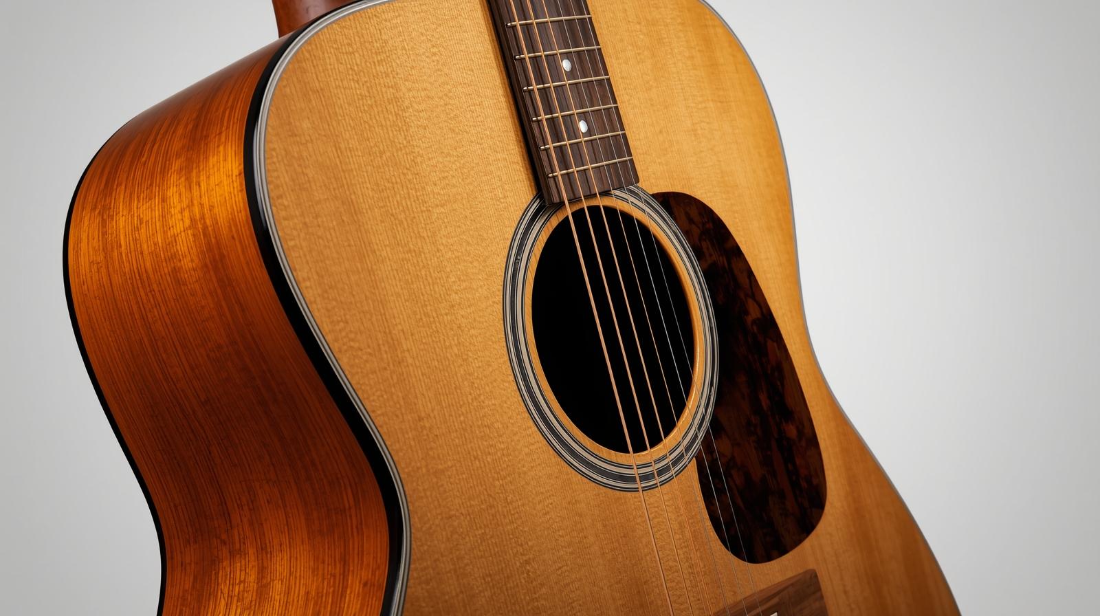 ドレッドノートギターのサイド写真 - 大きなボディサイズとf-holeを強調
